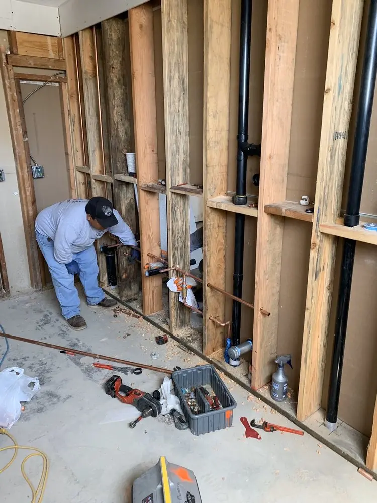 Commercial rough-in plumbing for Water Heater Replacement in Rockdale